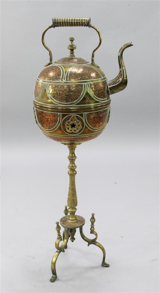 A large North African copper on brass kettle combined brazier, height 3ft 4in.